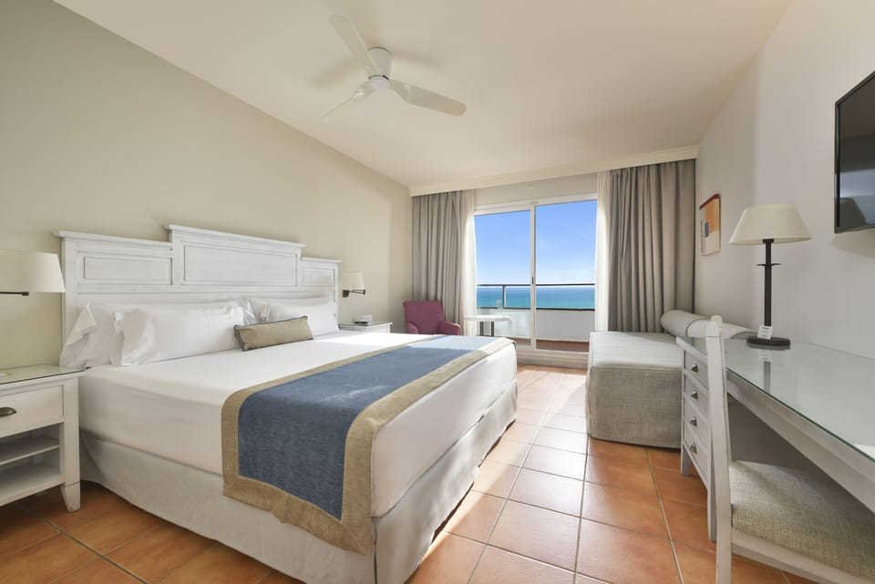 Superior Double Room, Sea View, Sea Facing | Minibar, desk, iron/ironing board, free WiFi