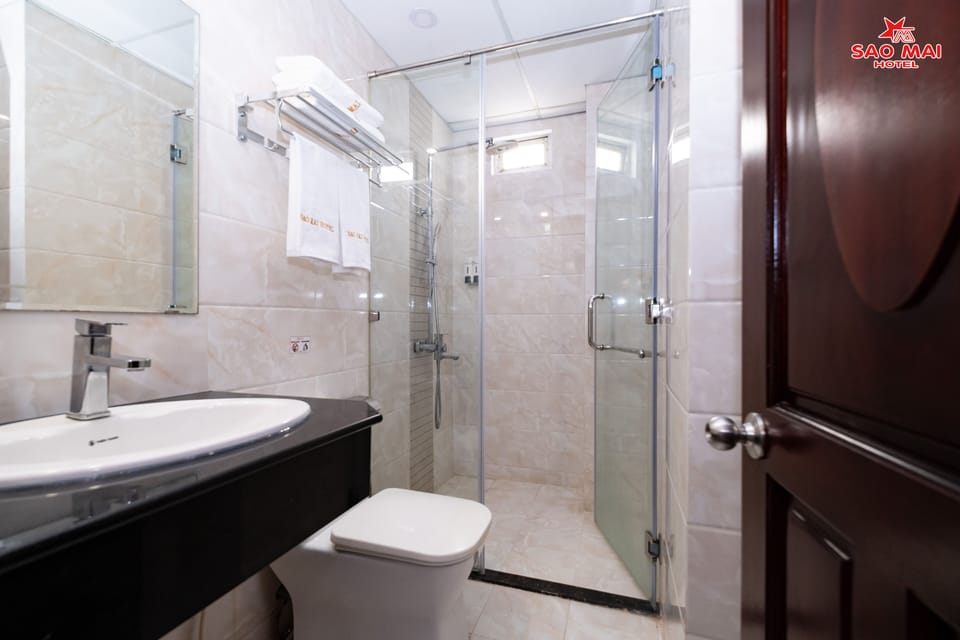 Hair dryer, slippers, towels, soap