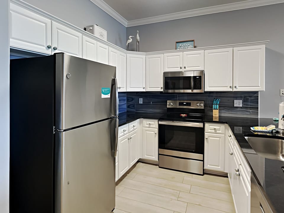 Condo, Multiple Beds, Kitchen, Ocean View (Ocean Villa #2106) | Private kitchen | Fridge, microwave, coffee/tea maker, cookware/dishes/utensils