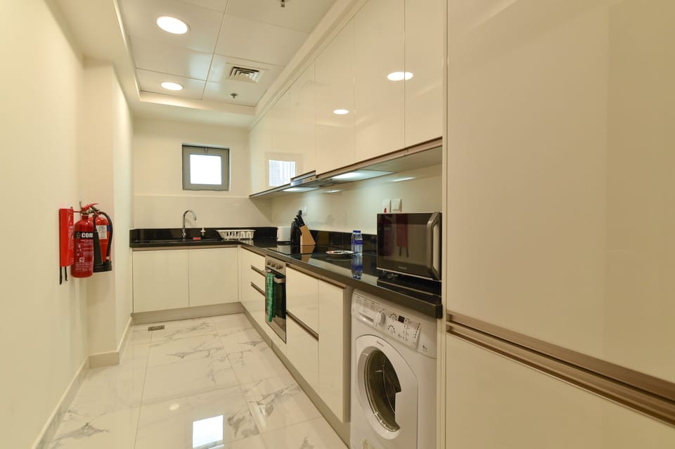 Apartment | Private kitchen | Full-size fridge, dishwasher, coffee grinder, cookware/dishes/utensils