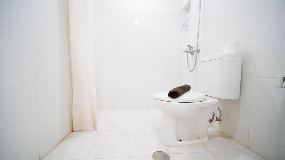 Homey 2Br With Extra Room At Taman Beverly Apartment Apartment in Surabaya