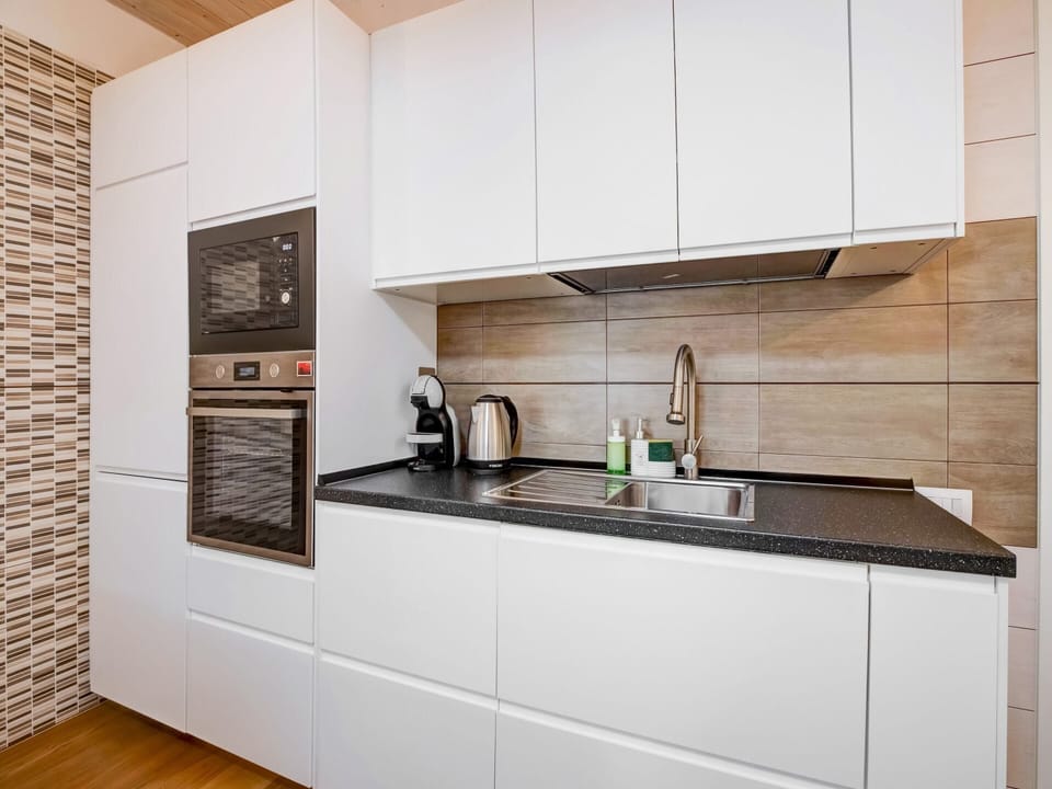 Apartment | Private kitchen | Electric kettle, toaster, highchair