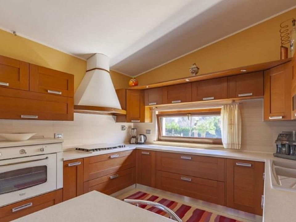 Villa | Private kitchen | Electric kettle, highchair