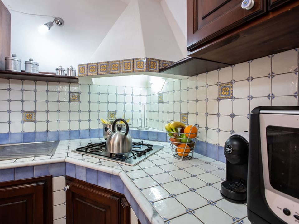 Villa | Private kitchen | Electric kettle, highchair
