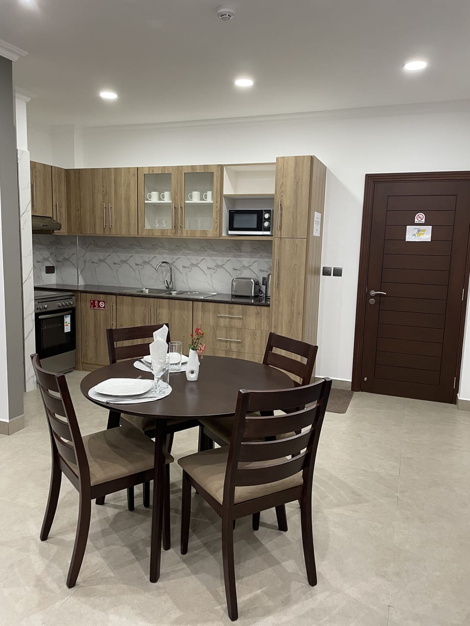 Standard Apartment | Private kitchen | Electric kettle, dining tables