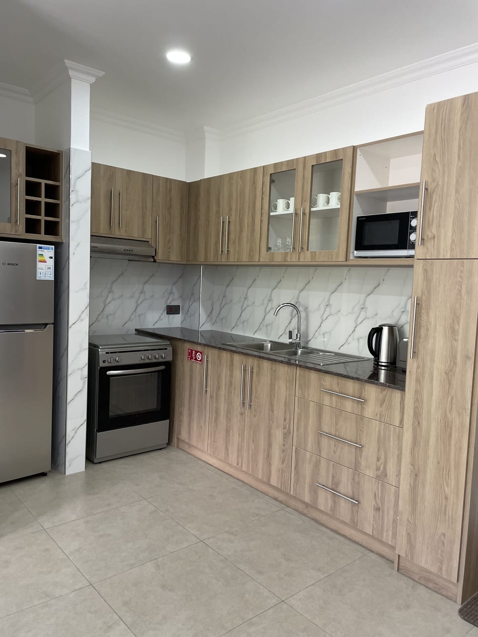 Standard Apartment | Living area | 110-cm LED TV with cable channels, TV