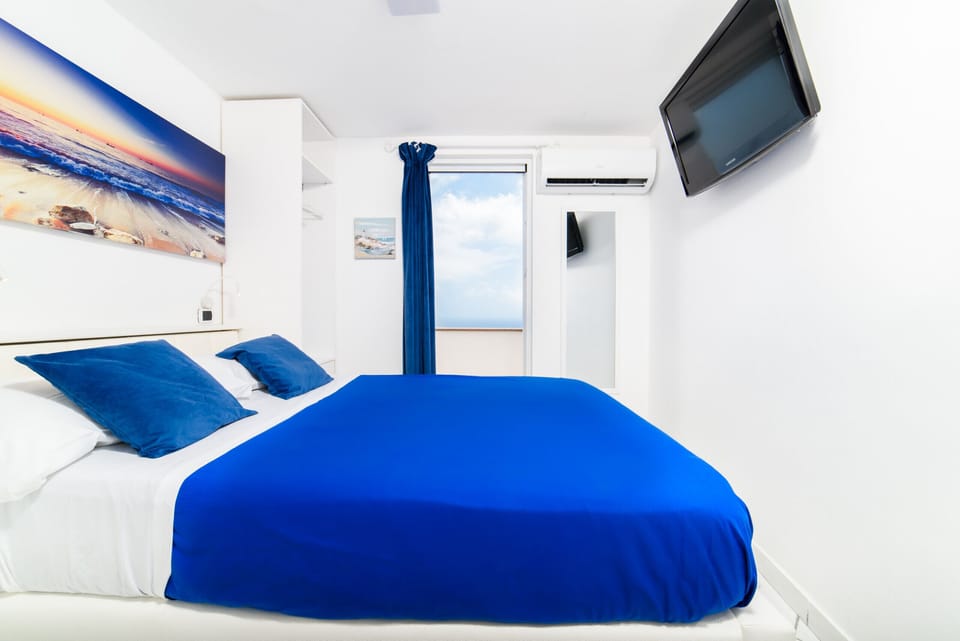 2 bedrooms, down comforters, memory foam beds, blackout drapes