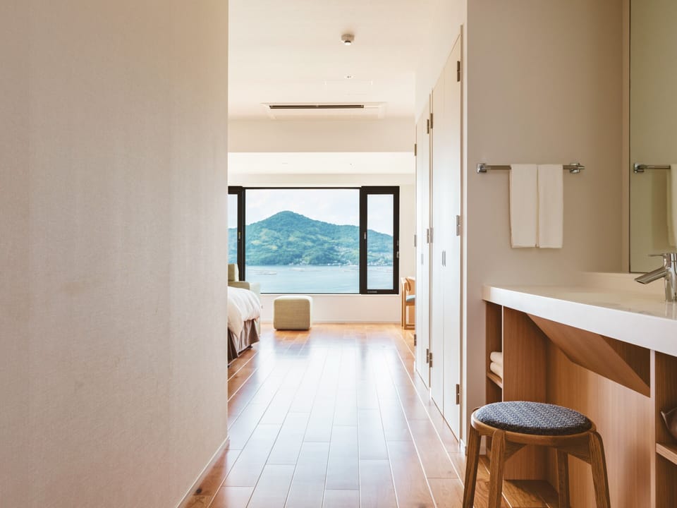 Deluxe Twin Room, Non Smoking, Private Bathroom (Accessible bath) | Down comforters, in-room safe, soundproofing, WiFi (free)