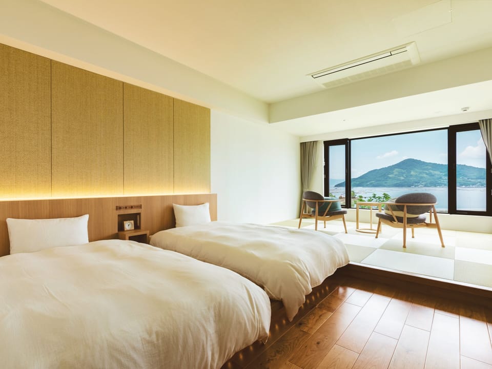 Deluxe Japanese Western-style Room, Non Smoking, Shower only | Down comforters, in-room safe, soundproofing, WiFi (free)