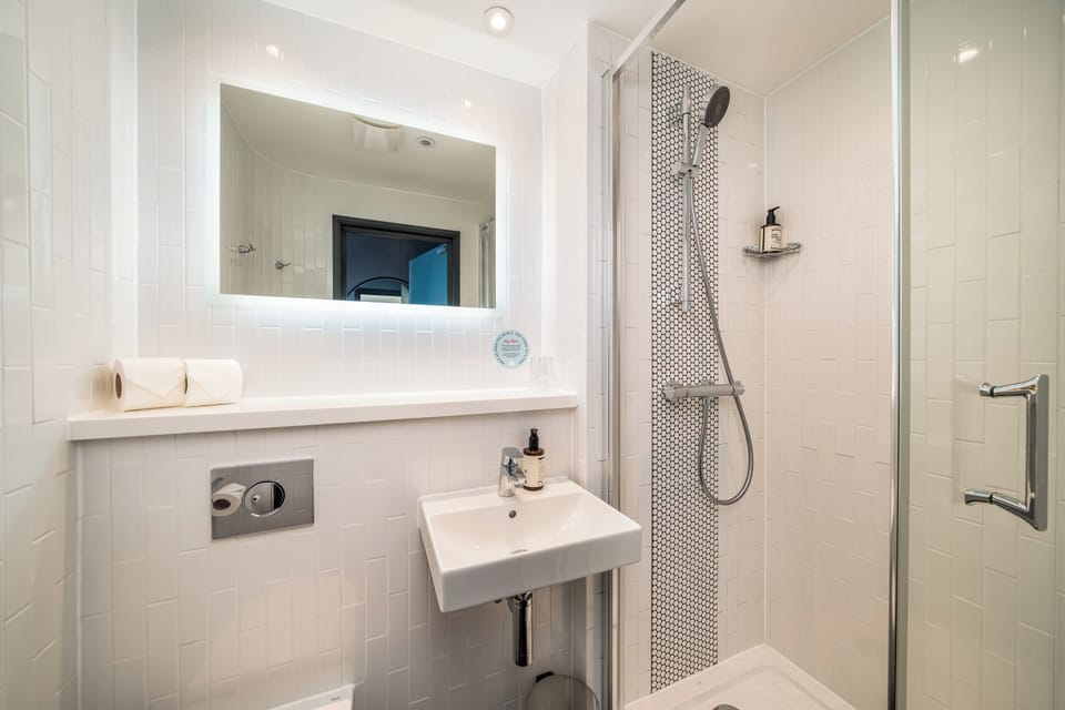 Shower, free toiletries, hair dryer, towels
