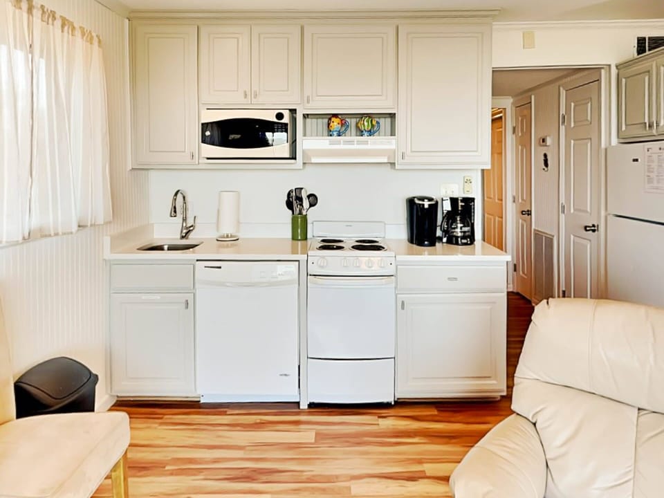 Condo, 1 King Bed, Balcony, Ocean View (Beach Racquet A221 - No Pets Allowed) | Private kitchen | Fridge, microwave, oven, stovetop