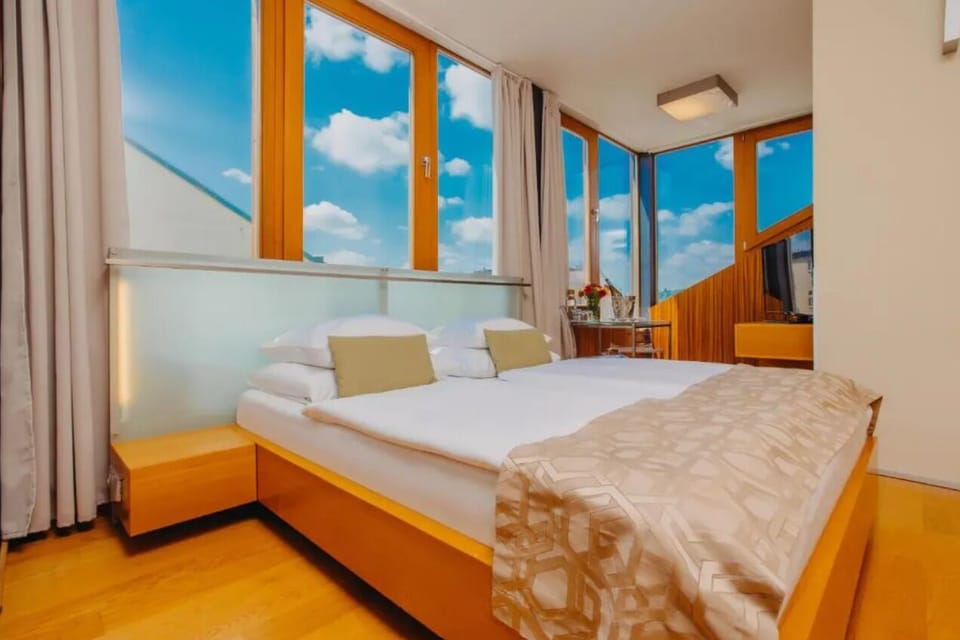 Deluxe Double Room Castle view | Minibar, in-room safe, desk, laptop workspace