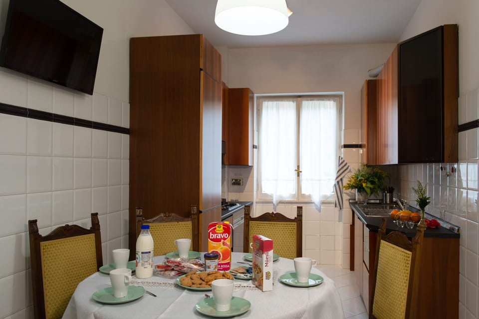 City Apartment | Living area | 40-inch flat-screen TV with digital channels, TV