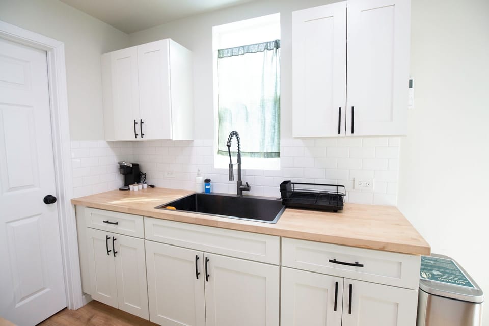 Elite Cabin, Beach View | Private kitchen | Mini-fridge, microwave, coffee/tea maker, dining tables