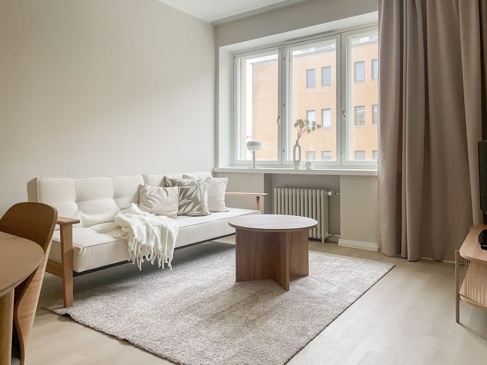 Comfort Apartment | Living area | Flat-screen TV