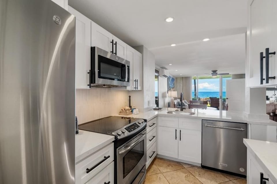 Condo, 2 Bedrooms | Private kitchen | Coffee/tea maker, fridge, oven