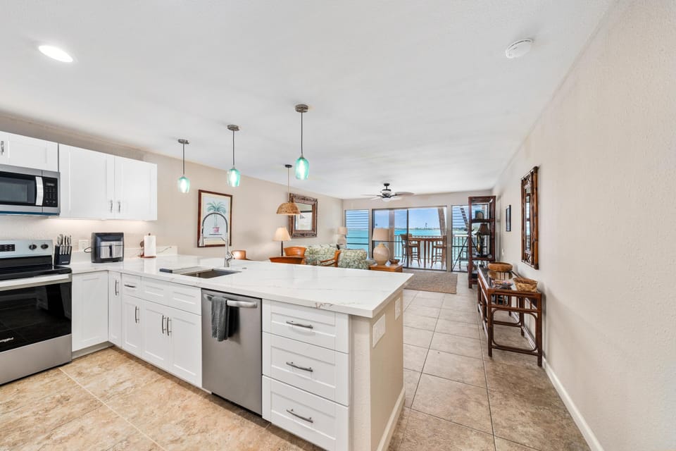 Condo, 2 Bedrooms | Private kitchen | Coffee/tea maker, fridge, oven, dishwasher