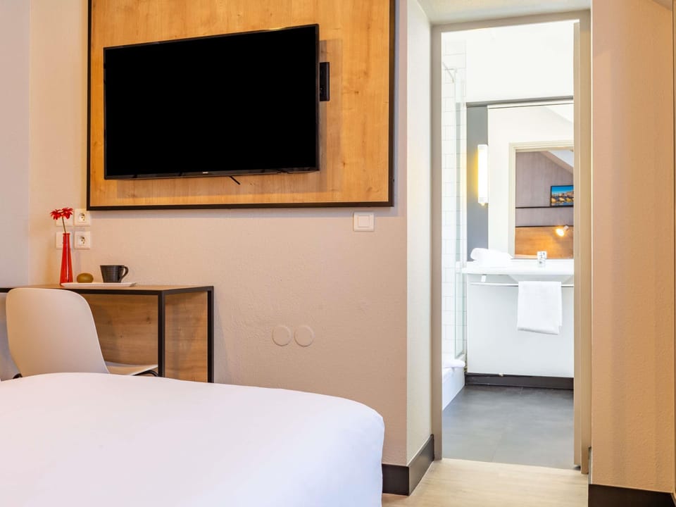 Desk, soundproofing, iron/ironing board, free cribs/infant beds