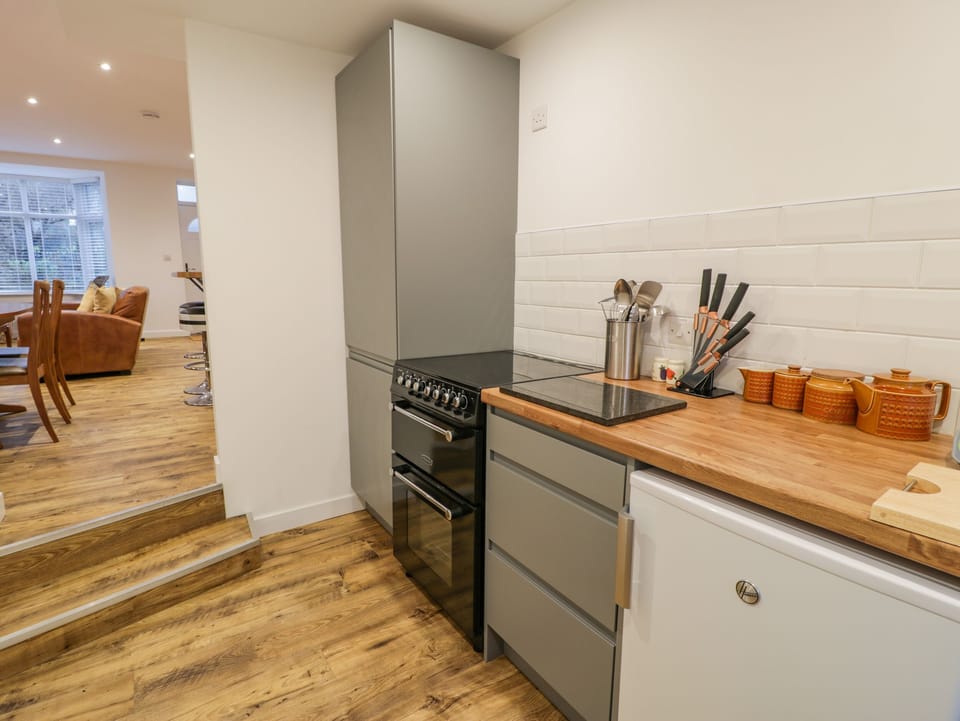 Fridge, electric kettle, toaster, cookware/dishes/utensils