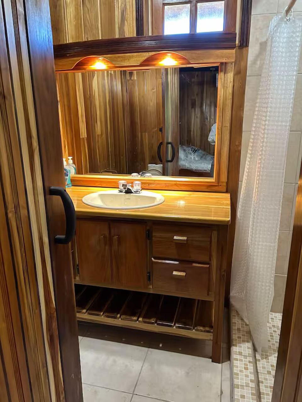 Shower, rainfall showerhead, designer toiletries, hair dryer