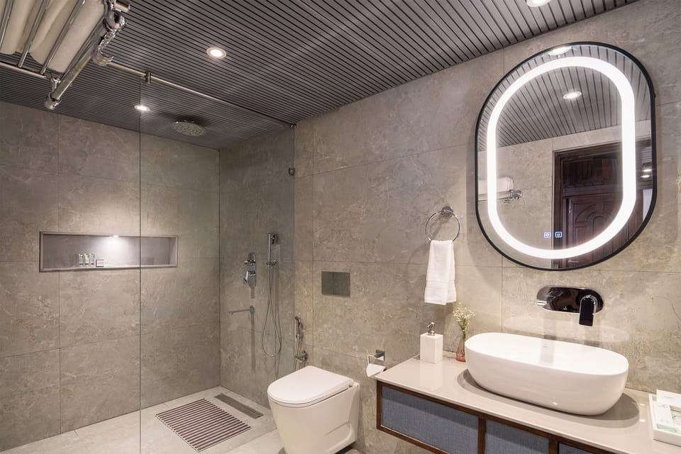 Luxury Room | Bathroom | Shower, free toiletries, towels, soap