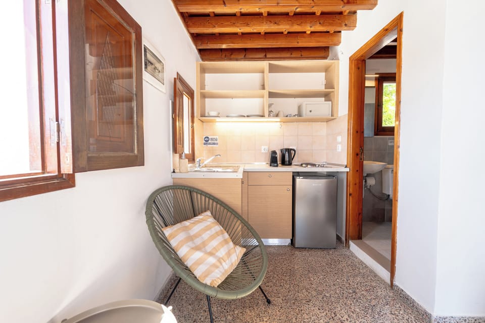 Rooftop Studio with Sea View | In-room safe, laptop workspace, blackout drapes, iron/ironing board