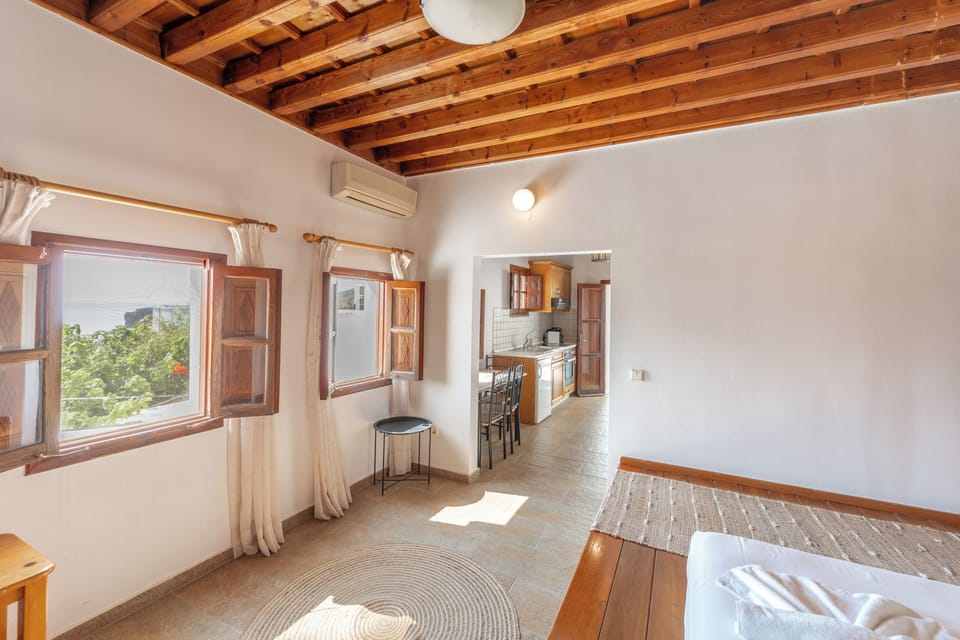 Traditional Suite with Terrace and Sea View | In-room safe, laptop workspace, blackout drapes, iron/ironing board