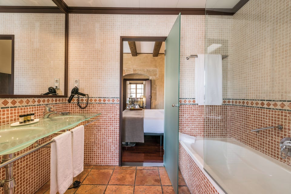 Superior Room | Bathroom | Hair dryer, bathrobes, slippers, towels