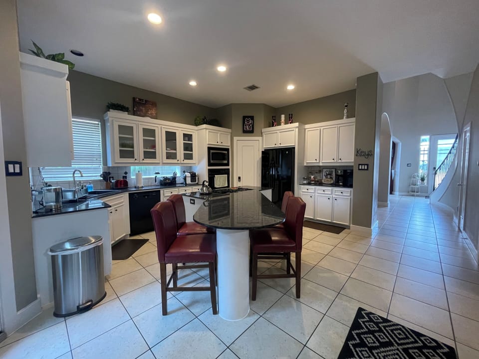 Luxury Villa | Private kitchen | Full-size fridge, microwave, oven, stovetop