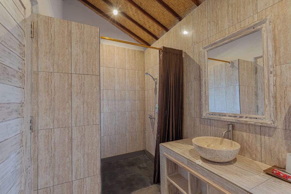 Designer toiletries, hair dryer, bathrobes, slippers