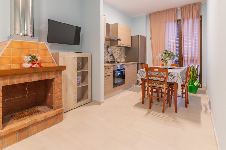 Basic Room, 2 Bedrooms | Living area | 40-inch LCD TV with digital channels, TV, fireplace