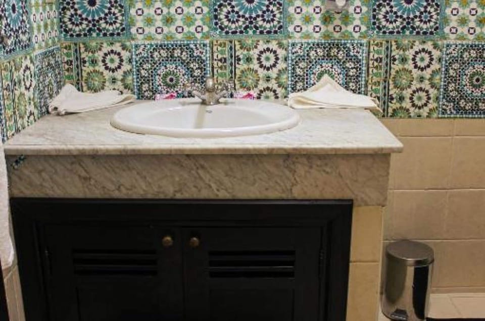 Bathtub, hair dryer, bathrobes, bidet