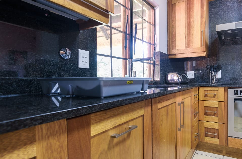 Family Chalet | Private kitchen | Full-size fridge, microwave, oven, dishwasher