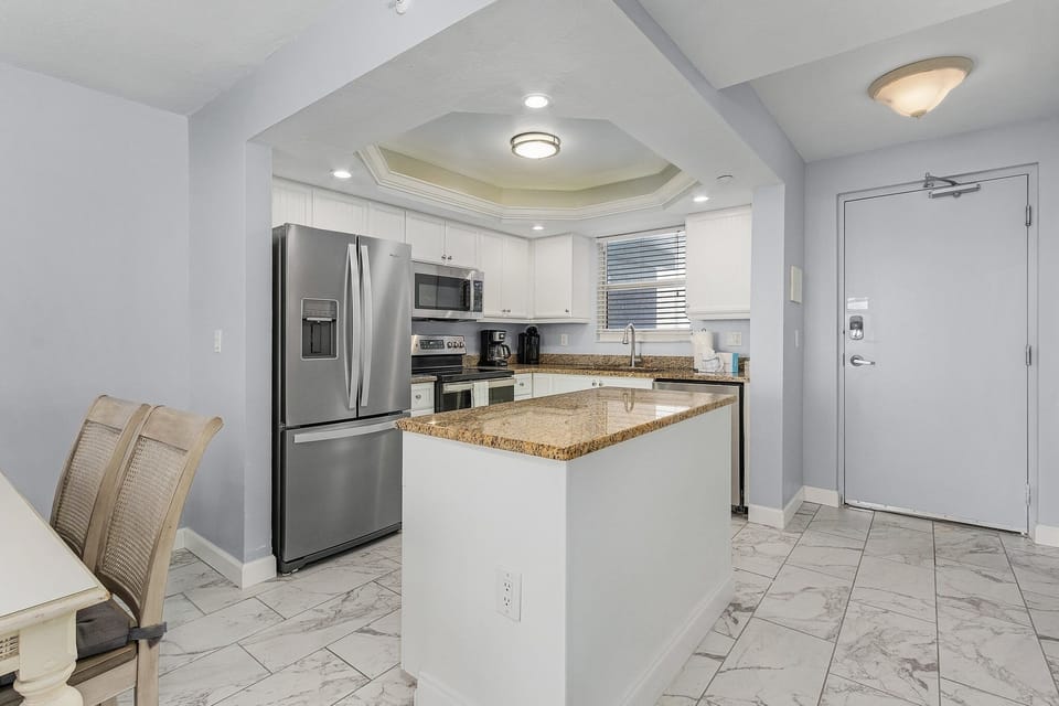 Condo, 2 Bedrooms | Private kitchen | Fridge, oven, coffee/tea maker