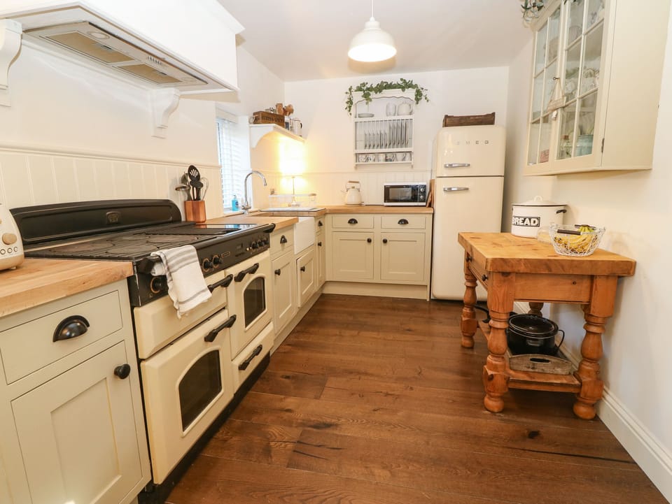 Fridge, electric kettle, toaster, cookware/dishes/utensils