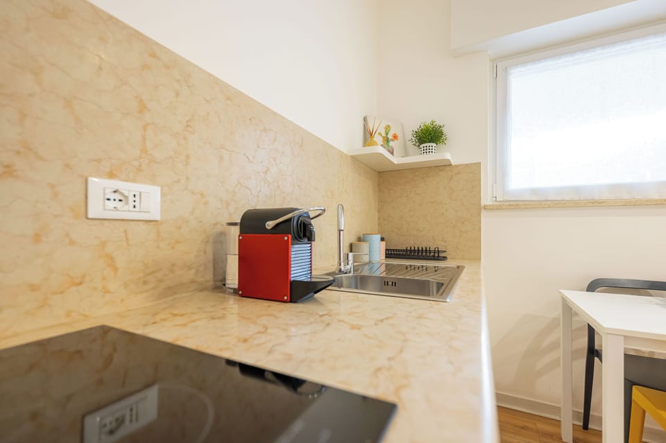 Comfort Apartment | Private kitchen | Full-size fridge, microwave, cookware/dishes/utensils, cleaning supplies