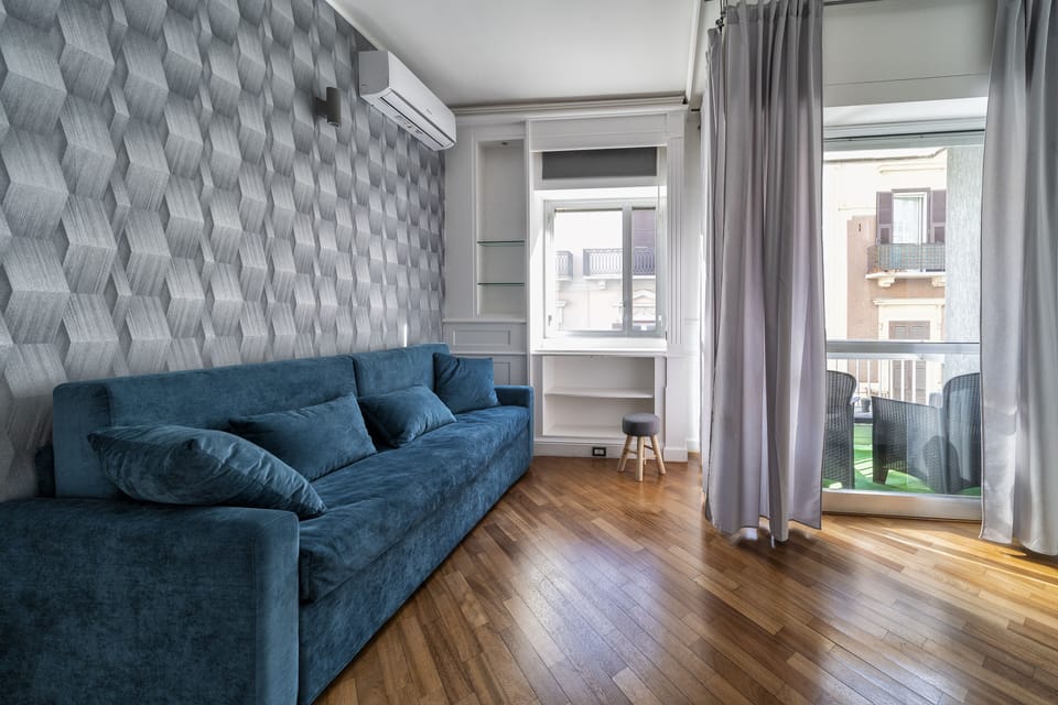 Deluxe Condo | Living area | Heated floors