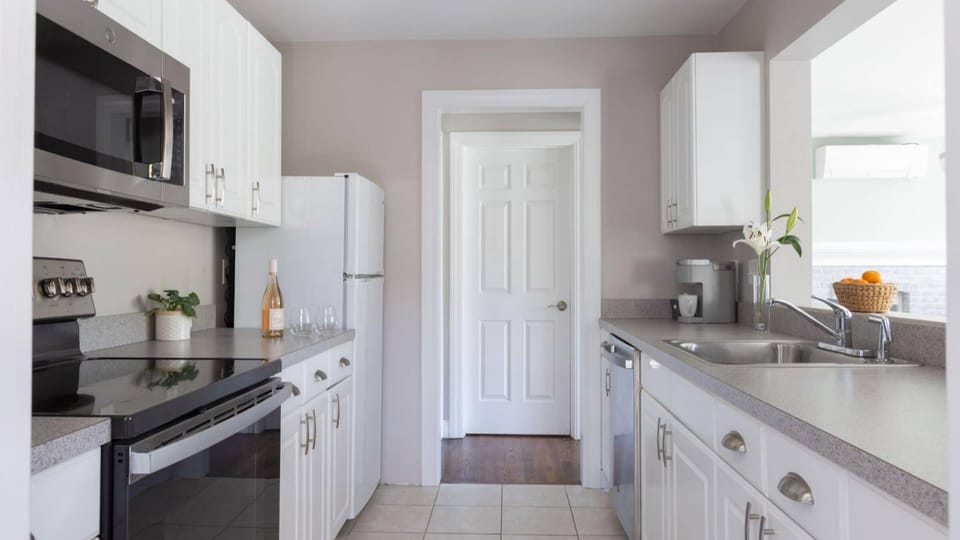 Garden View Patio Apartment | Private kitchen | Fridge, coffee/tea maker