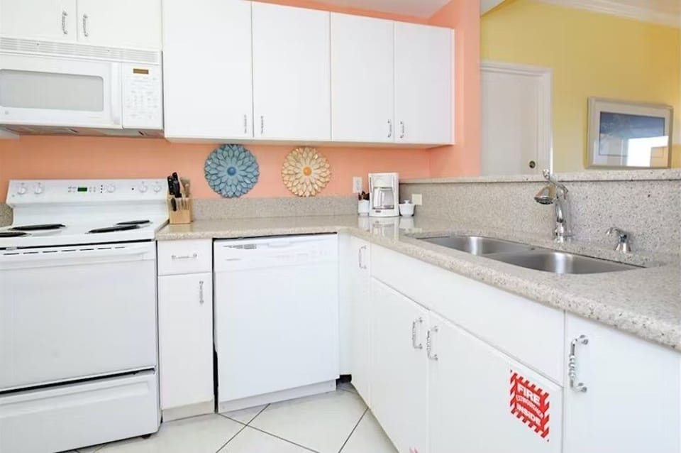 Condo, 2 Bedrooms | Private kitchen | Coffee/tea maker, fridge, oven, toaster
