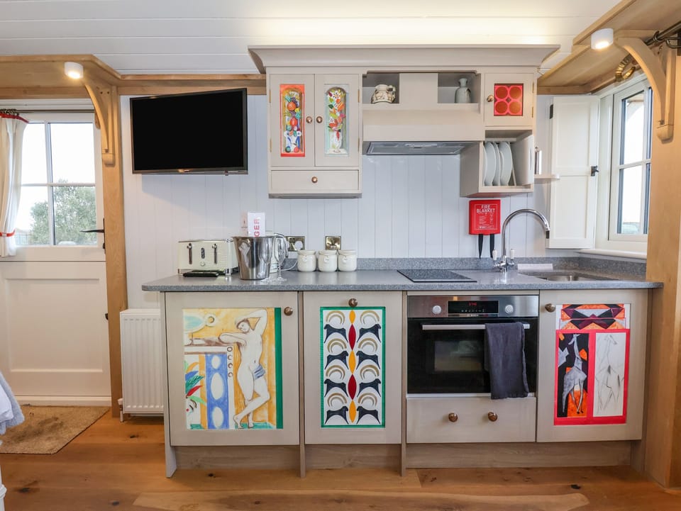 Fridge, electric kettle, toaster, cookware/dishes/utensils