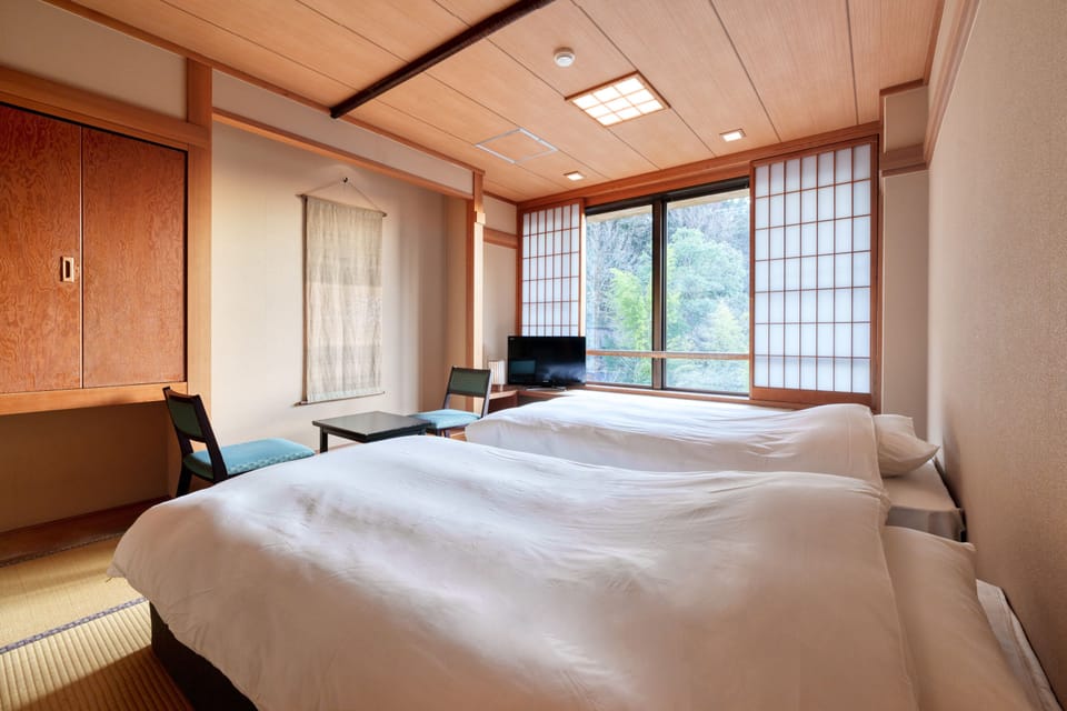 Japanese-Style Twin Room (8-tatami mats in size and 2 beds), Non Smoking | In-room safe, free WiFi, bed sheets