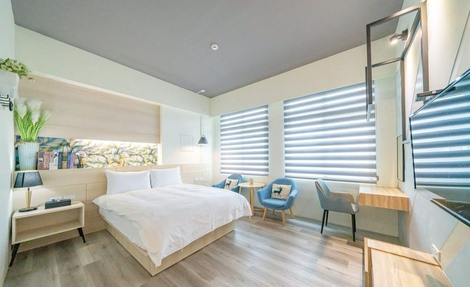 Superior Double Room | Living area | 34-inch LCD TV with digital channels, TV