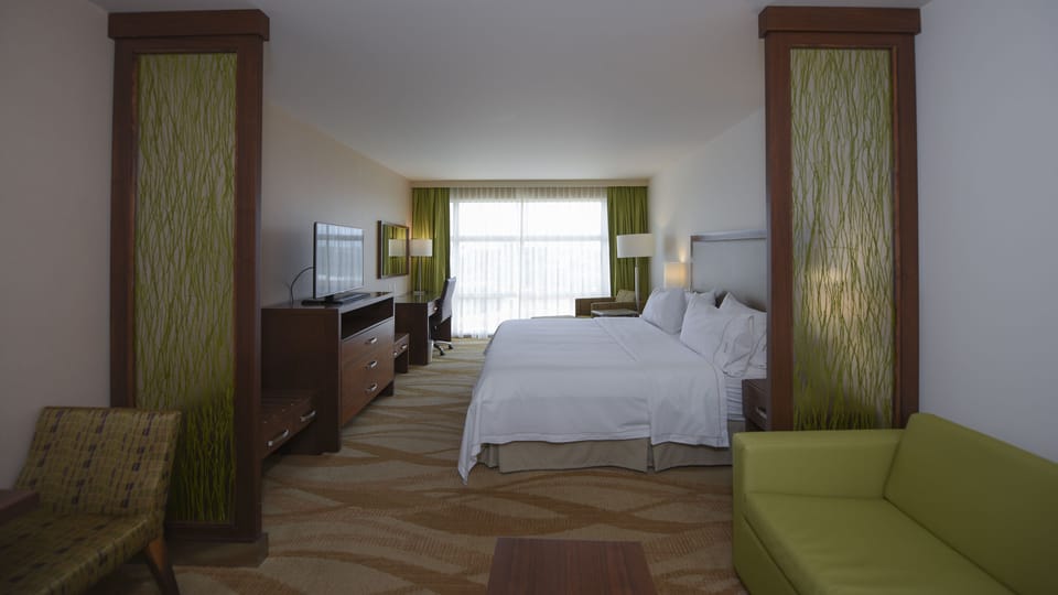 Suite, 1 King Bed (Top Floor) | 1 bedroom, minibar, in-room safe, desk