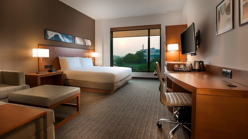 Premium bedding, memory foam beds, in-room safe, desk