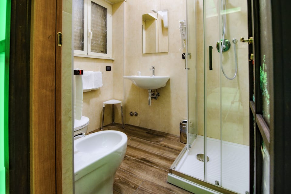 Rainfall showerhead, hair dryer, towels, soap