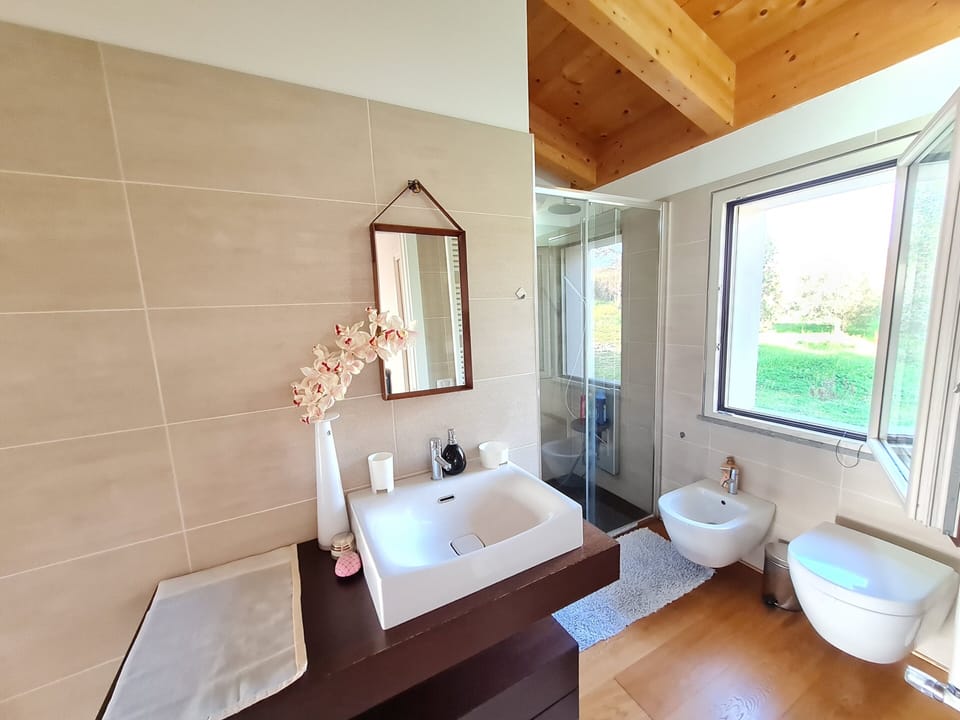 Family Villa, 2 Bedrooms, Patio, Ground Floor | Bathroom | Shower, hair dryer, bidet, towels