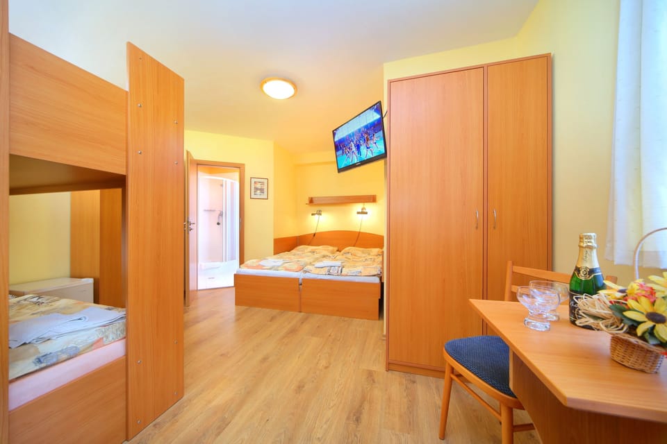 Family Room | Blackout drapes, cribs/infant beds, free WiFi, bed sheets