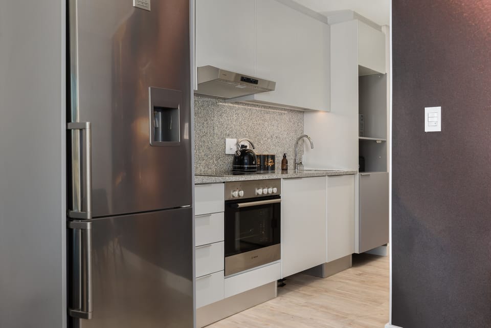 Exclusive Apartment | Private kitchen | Fridge, microwave, oven, stovetop