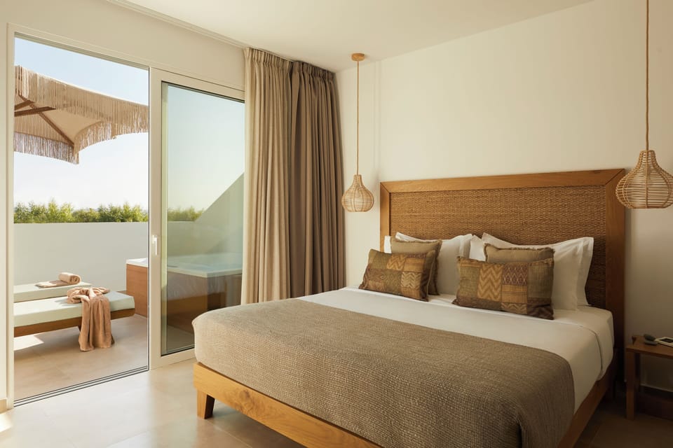 Junior Suite with openair Whirlpool | In-room safe, blackout drapes, soundproofing, iron/ironing board
