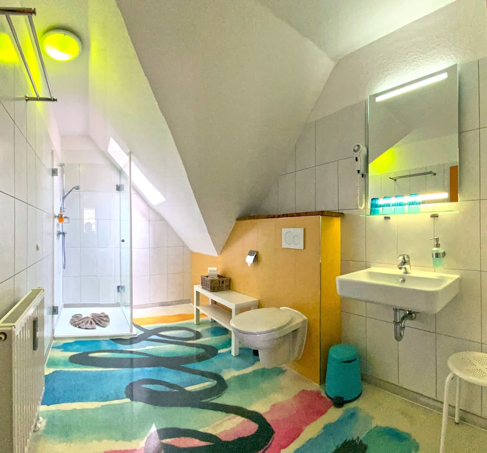 Bathtub, hair dryer, towels, soap
